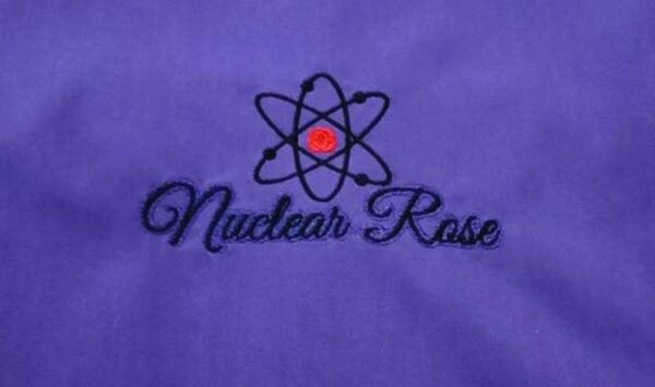 Logo on purple skirt